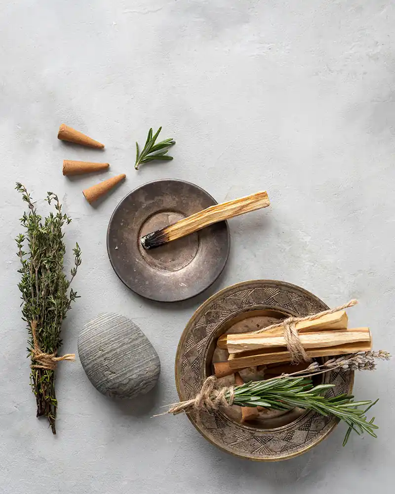 ritual sticks and herbs for burning on plates