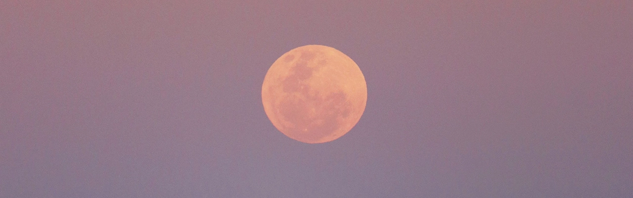 full moon on purple sky