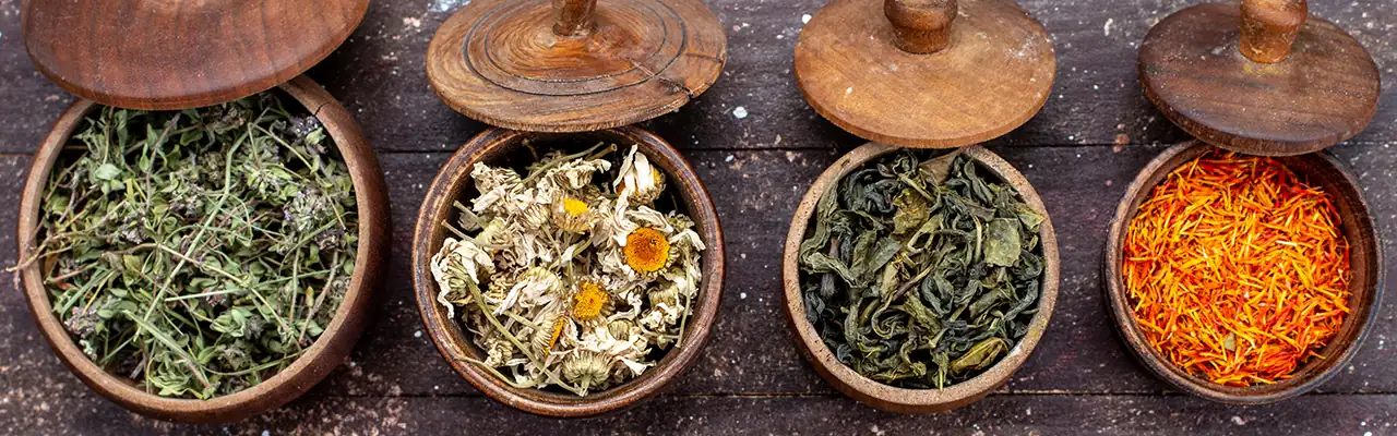 dried herbs in bowls